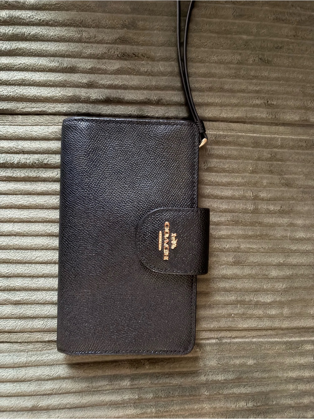 Coach Black Pebbled Leather Wristlet Phone Case with Gold Logo